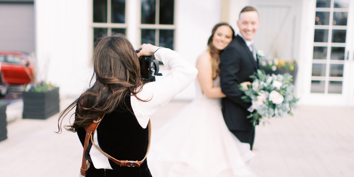 Marcela Plosker photographing a wedding couple in North Shore, Massachusetts