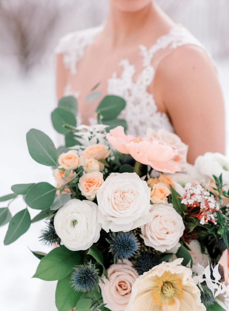 A close up shot of a bride's bouquet, photographed by Marcela Plosker, a Boston wedding photographer, as she explains 10 Questions to Ask Your Wedding Photographer Before you Book.