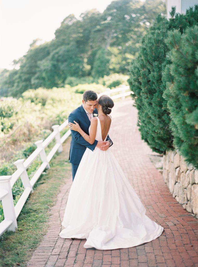 A portrait of a bride and groom photographed by Massachusetts wedding photographer Marcela Plosker as she explains how to choose a wedding photographer you'll love.